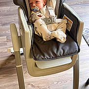 Charles joined the competition — help win amazing prizes! baby, high_chair, pacifier, onesie, indoor, child, flooring, wood_floor, seat_belt, infant, baby_clothes, baby_seat, furniture, baby_girl, baby_boy, baby_face, baby_hands, baby_feet, home_interior, child_safety