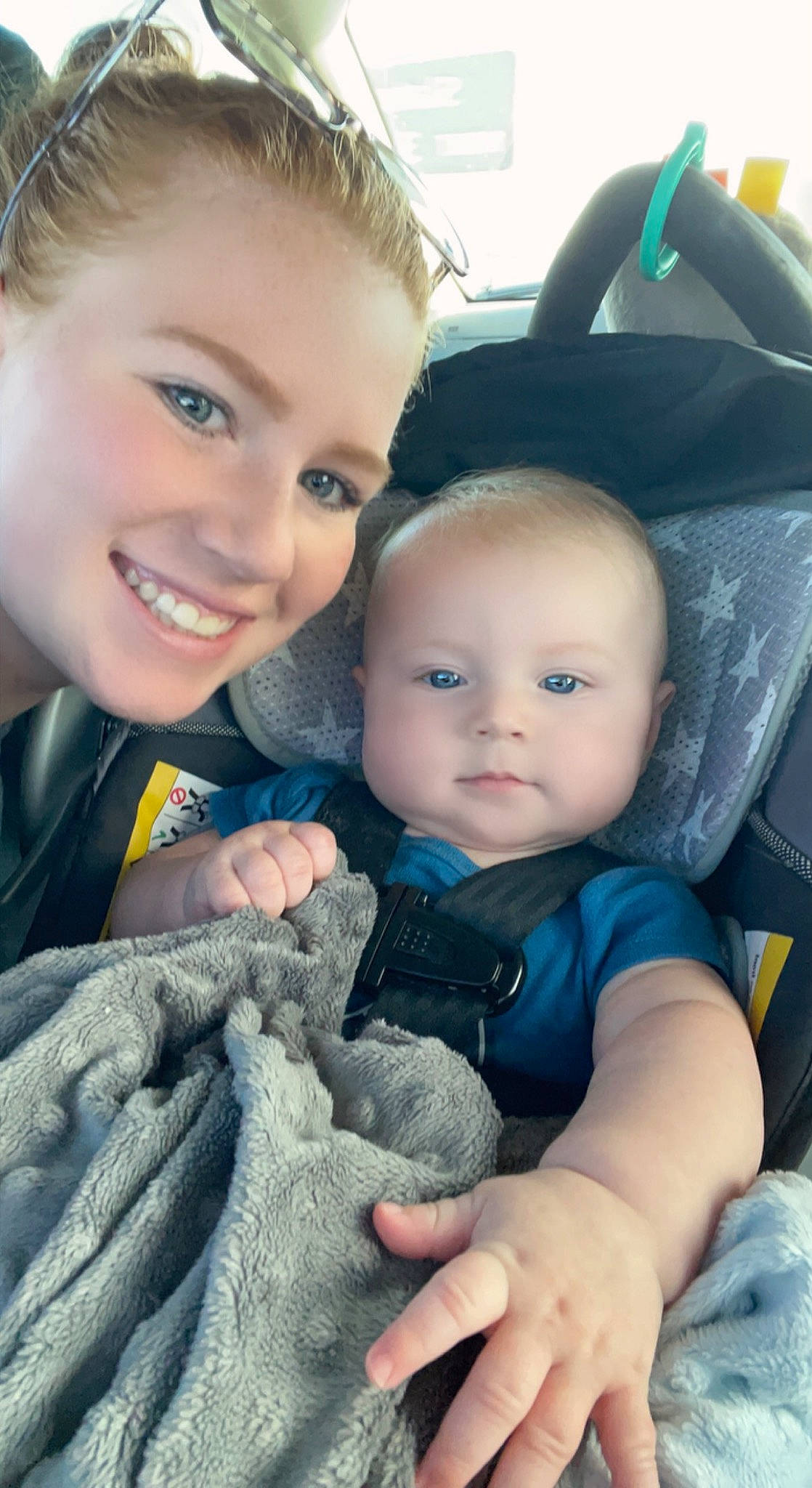 Kolt is registered to the contest to win money with this photo: baby_toddler_clothing, blue, cheek, chin, eye, face, facial_expression, finger, gesture, hairstyle, happy, head, interaction, iris, joy, mammal, organ, person, photograph, skin