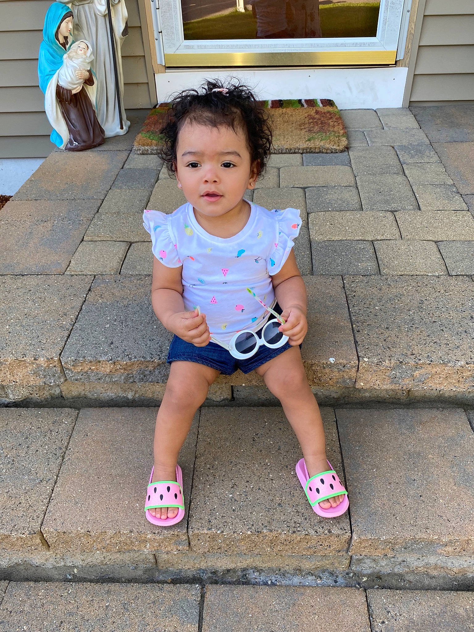 Melissa is registered to the contest to win money with this photo: baby, beauty, child, leg, person, pink, plant, shoe, sitting, skin, smile, snapshot, summer, toddler, vacation