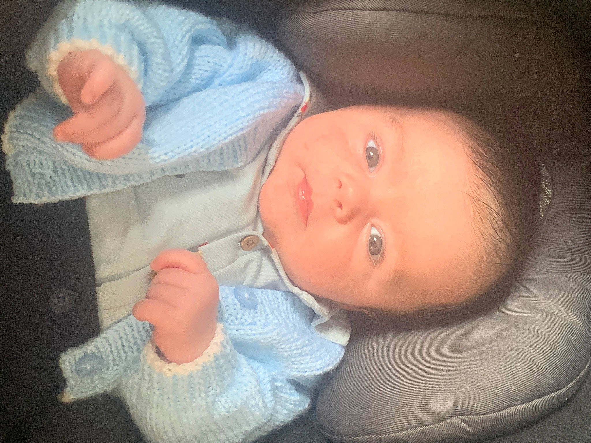 Alfie is registered to the contest to win money with this photo: baby, cheek, child, chin, ear, eye, finger, hand, lip, mouth, nose, person, skin, thumb, toddler