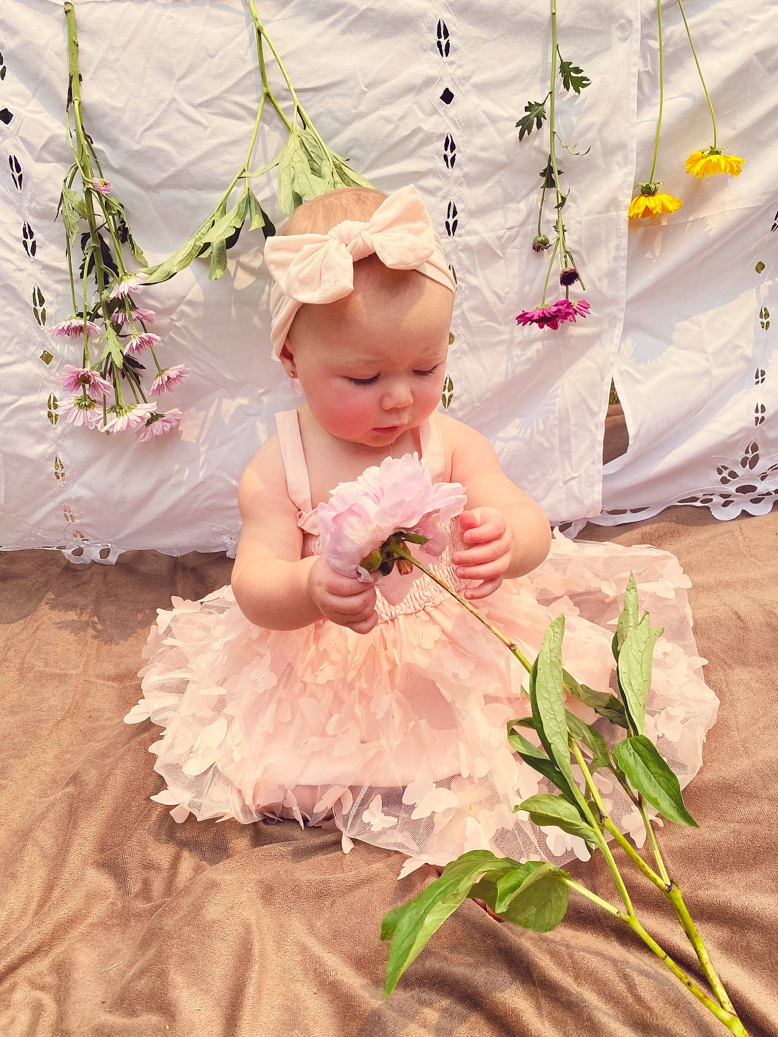 Kynlee joined the competition — help win amazing prizes! baby, baby_toddler_clothing, bouquet, bridal_accessory, child, cut_flowers, dress, event, floral_design, flower, flower_arranging, happy, headpiece, peach, person, petal, pink, plant, textile, toddler