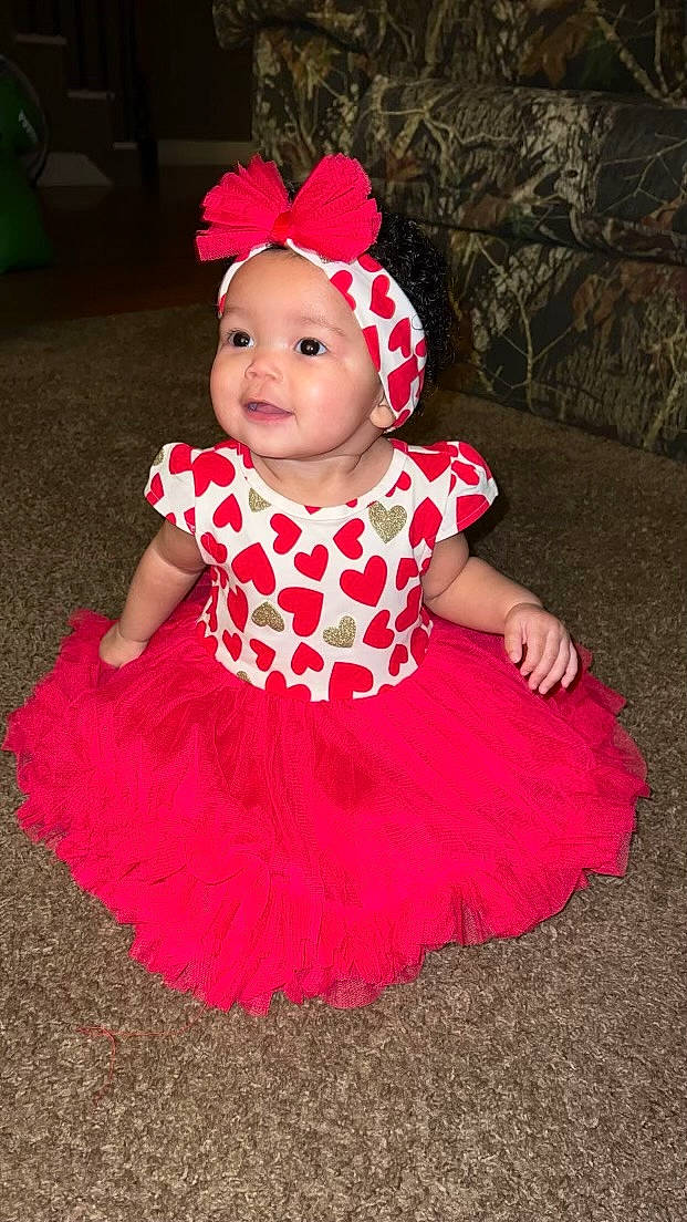 Alannah is registered to the contest to win money with this photo: baby, baby_toddler_clothing, child, costume, costume_hat, day_dress, dress, embellishment, event, fashion_accessory, fun, happy, headgear, headwear, magenta, pattern, person, pink, ruffle, sleeve