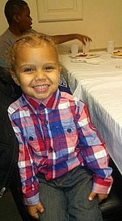 Kadyn joined the competition — help win amazing prizes! cheek, child, design, face, finger, forehead, head, joy, pattern, person, plaid, smile, tartan, thumb, toddler, under_exposed