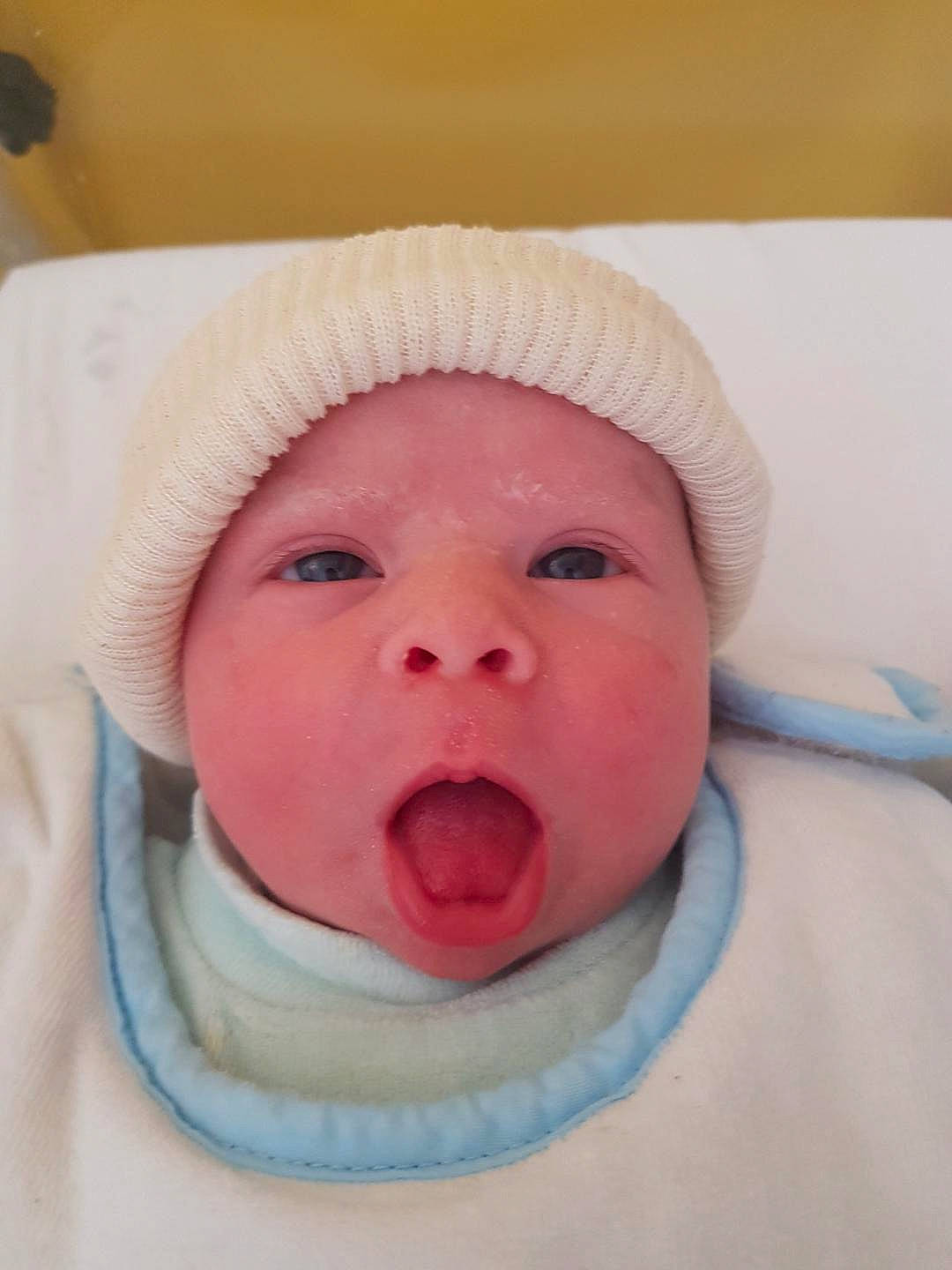 Hayden participe au concours pour gagner de l'argent avec cette photo : baby, baby_toddler_clothing, bonnet, cheek, child, chin, close_up, eyebrow, eyelash, headgear, headwear, iris, jaw, lip, nose, organ, person, photography, skin, toddler