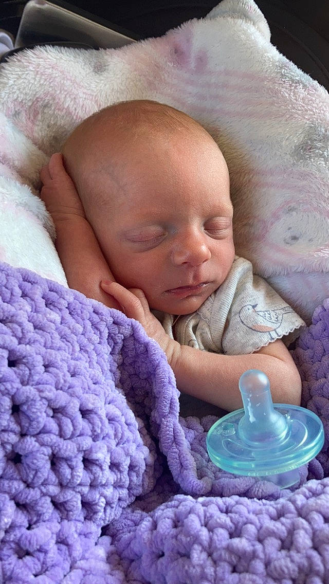 Elsie is registered to the contest to win money with this photo: baby, baby_sleeping, baby_toddler_clothing, beauty, blue, cheek, child, close_up, comfort, iris, linens, organ, people, person, photograph, pink, product, purple, skin, textile