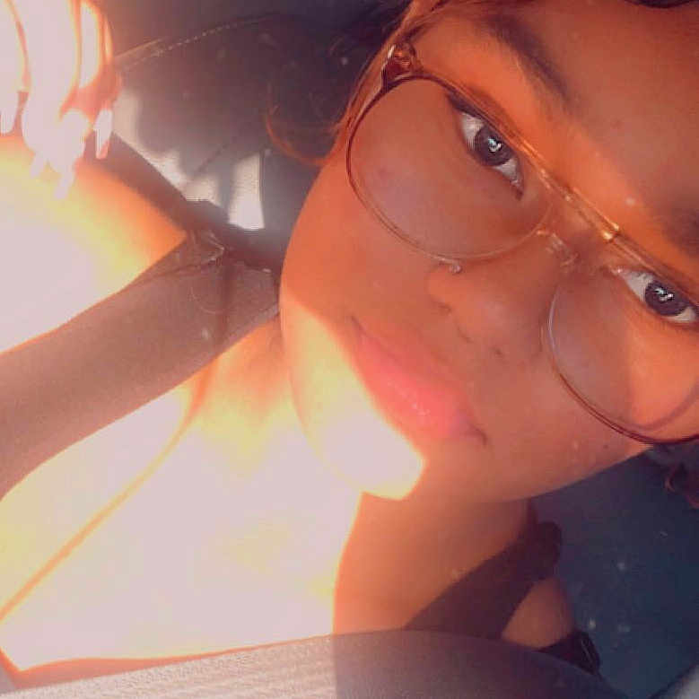 Kaliyah joined the competition — help win amazing prizes! automotive_lighting, black_hair, brown_hair, electric_blue, eye, eyelash, eyewear, flash_photography, fun, gesture, glasses, human_leg, jaw, lens_flare, lip, long_hair, mouth, nose, tints_and_shades, vision_care