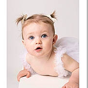 Aria joined the competition — help win amazing prizes! baby, child, tutu, pigtails, bows, blue_eyes, cute, infant, portrait, white_background, curious, soft_lighting, studio_photo, small_hands, face, expression, innocence, adorable, closeup, clothing