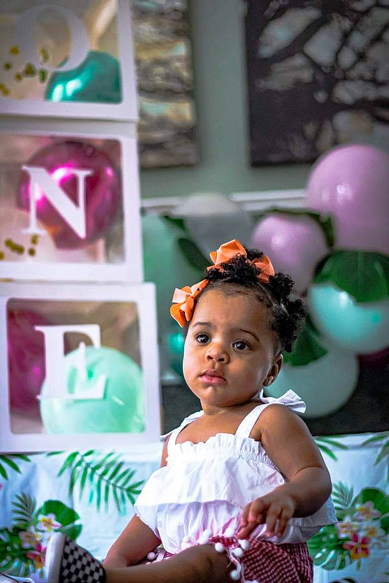 Taylani joined the competition — help win amazing prizes! baby, baby_toddler_clothing, balloon, beauty, chair, event, fashion_design, flash_photography, fun, green, happy, headgear, magenta, party_supply, person, pink, purple, room, textile, toddler