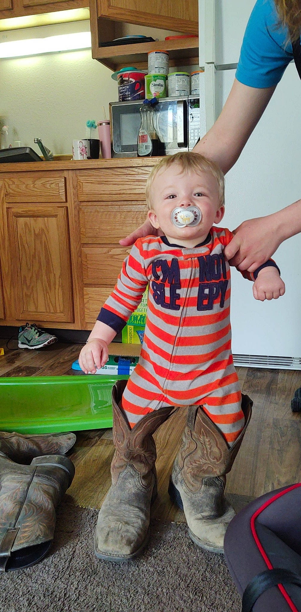 Kolton is registered to the contest to win money with this photo: baby, child, person, play, sitting, smile, standing, toddler