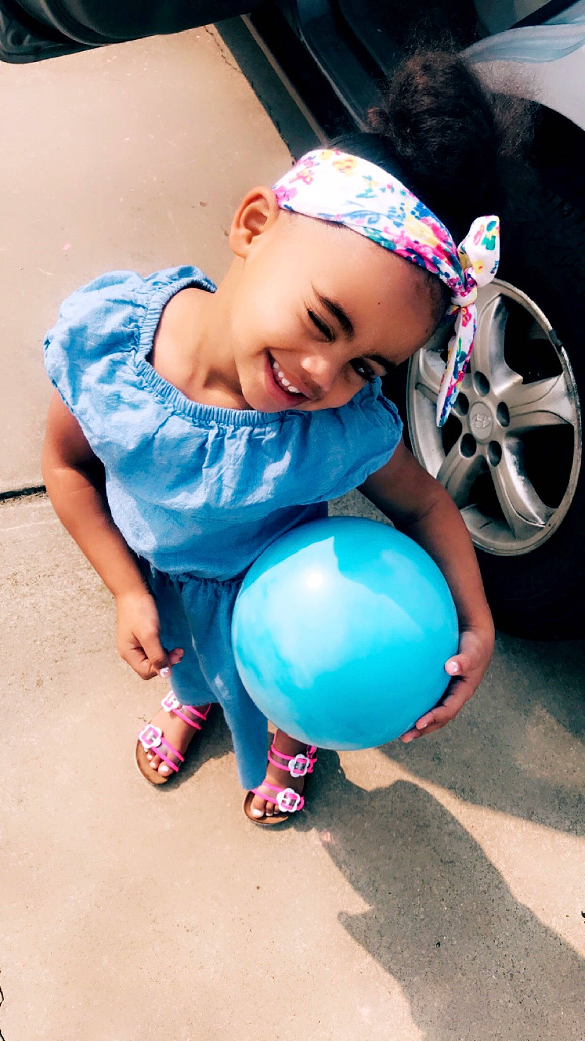 Londyn joined the competition — help win amazing prizes! baby, ball, balloon, blue, child, fun, happy, headgear, headwear, joy, leisure, party_supply, person, photography, pink, play, sitting, smile, toddler, vacation