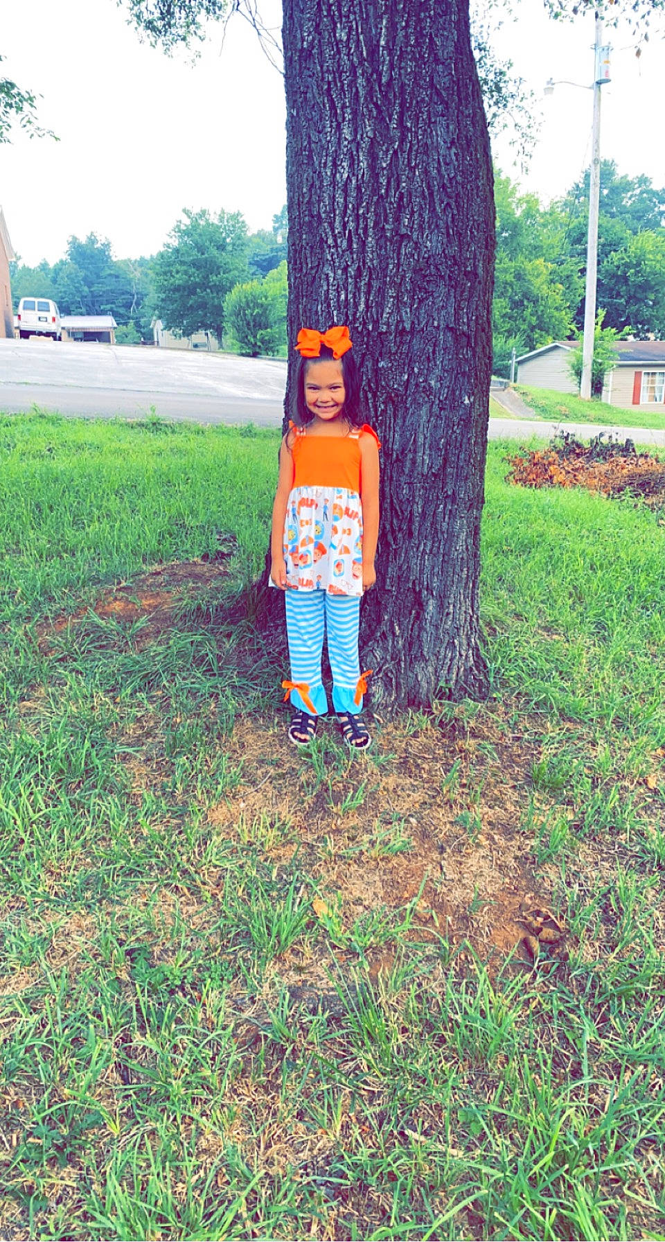 Aleiyah is registered to the contest to win money with this photo: asphalt, deciduous, fun, garden, grass, hat, joy, landscape, leaf, leisure, people_in_nature, person, plant, recreation, shoe, soil, t_shirt, tints_and_shades, toddler, tree