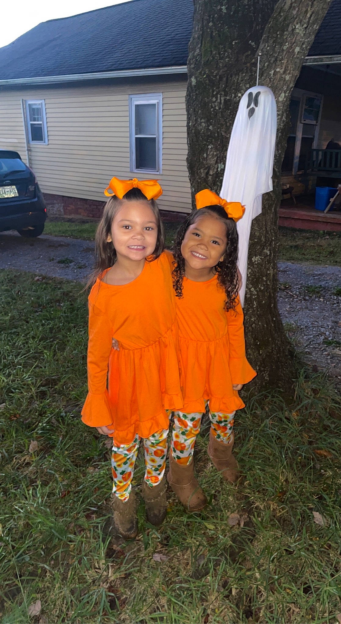 Aleiyah joined the competition — help win amazing prizes! asphalt, car, child, costume, event, fun, grass, happy, house, joy, orange, people_in_nature, person, personal_protective_equipment, pumpkin, smile, toddler, tree, trick_or_treat, vehicle_door