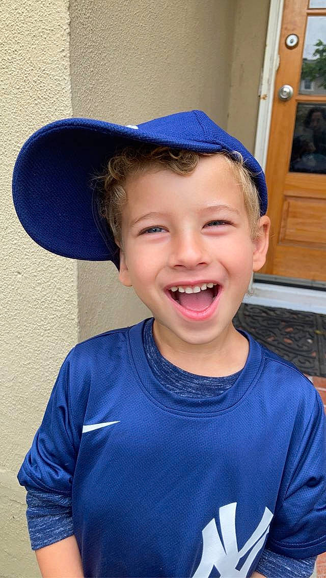 Bowie is registered to the contest to win money with this photo: cap, chin, cool, door, electric_blue, eye, eyebrow, forehead, fun, happy, hat, jaw, joy, lip, mouth, nose, person, sleeve, smile, t_shirt