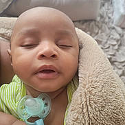 Elijah joined the competition — help win amazing prizes! baby, infant, sleeping, blanket, pacifier, closeup, face, peaceful, cozy, resting, child, skin, soft, indoor, portrait, newborn, cuteness, comfort, toddler, relaxation