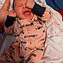 Arielle joined the competition — help win amazing prizes! baby, newborn, infant, onesie, clothing, hand, fist, face, crying, yawning, blanket, sleepwear, person, cute, soft, sleeping, comfort, closeup, indoors, resting