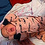Arielle joined the competition — help win amazing prizes! baby, infant, sleepwear, yawn, blanket, hand, clothing, newborn, person, cute, lying_down, soft_fabric, pink, black_cuffs, face, closed_eyes, mouth_open, cozy, resting, indoors