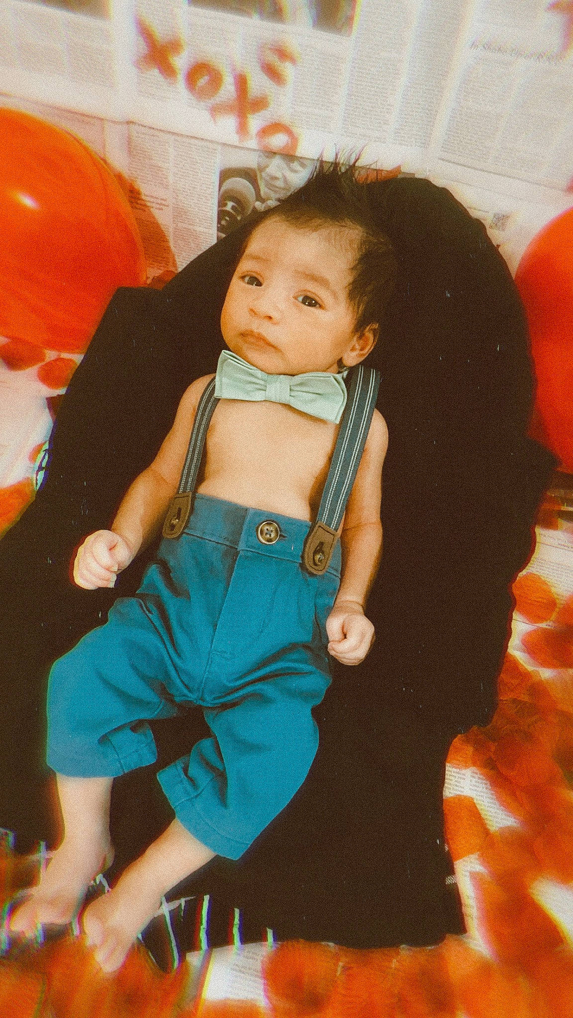 Andreas is registered to the contest to win money with this photo: baby, baby_toddler_clothing, balloon, child, comfort, fun, hair, hairstyle, happy, head, human, human_body, human_leg, leisure, orange, person, sitting, skin, standing, thigh