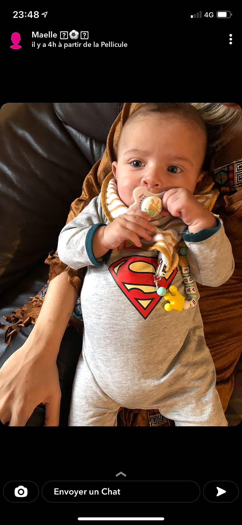 Kaïs participe au concours pour gagner de l'argent avec cette photo : arm, baby, baby_toddler_clothing, cheek, eye, finger, gesture, hand, happy, iris, lip, mouth, nail, nose, orange, person, skin, sleeve, t_shirt, thumb