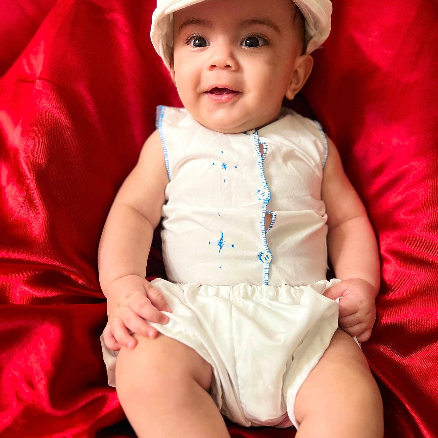 Adrián joined the competition — help win amazing prizes! baby, bodypart, cap, clothing, couch, cushion, diaper, face, finger, furniture, hand, hat, head, homedecor, newborn, person, photography, portrait, shorts, sitting