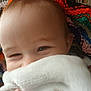 Tristan joined the competition — help win amazing prizes! baby, blanket, closeup, face, infant, knitted_blanket, colorful, cozy, cute, child, smile, soft_texture, hand, indoors, portrait, young, happy, wrapped, warm, playful