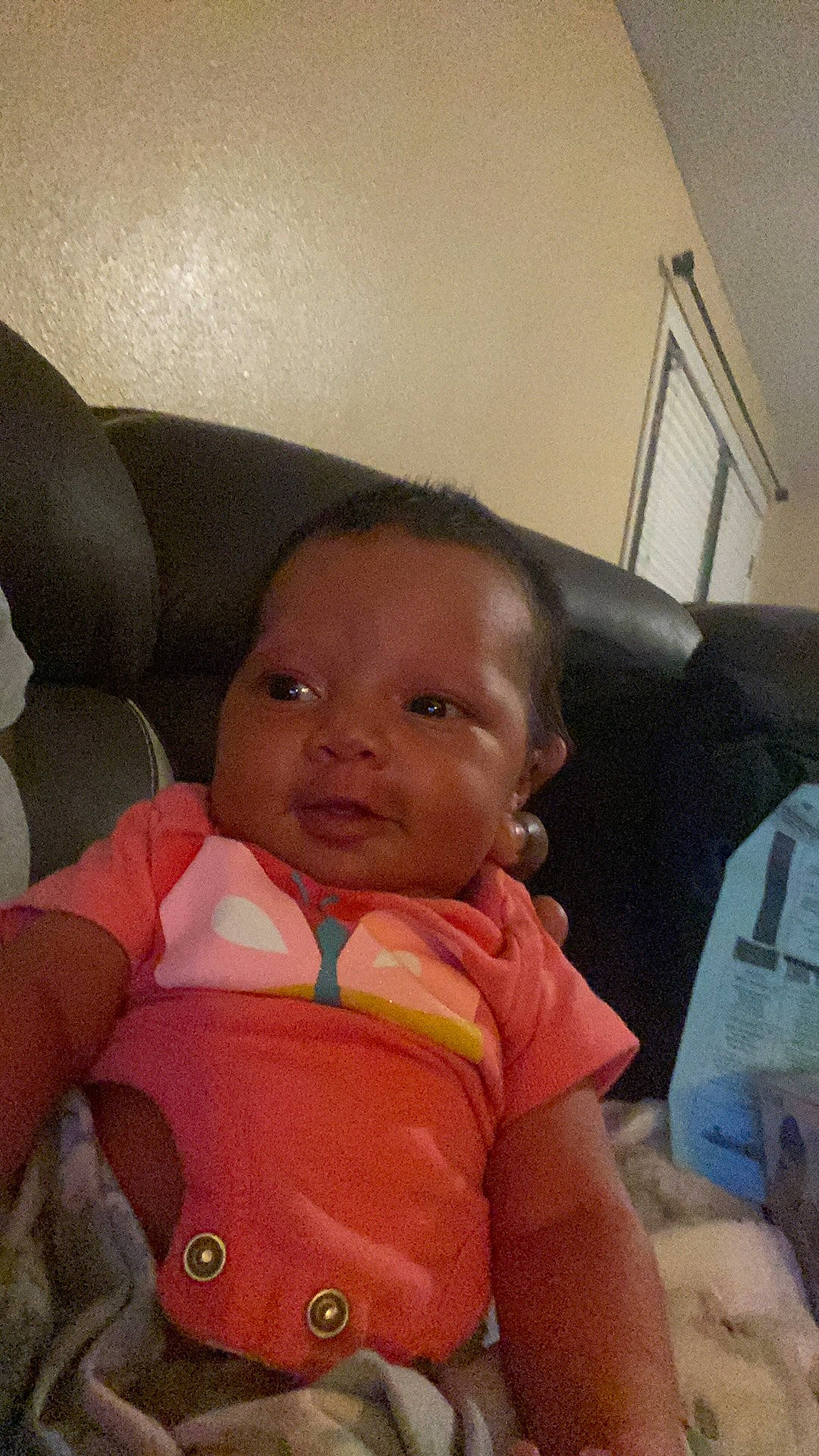 Lazayne is registered to the contest to win money with this photo: baby, baby_toddler_clothing, car_seat, cheek, chin, comfort, eye, facial_expression, finger, forehead, hair, happy, head, iris, lip, mouth, nose, person, skin, smile