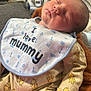 Theo is registered to the contest to win money with this photo: baby, newborn, sleeping, bib, clothing, pajamas, winnie_the_pooh, blanket, face, infant, cute, resting, indoors, soft, child, peaceful, person, home, cozy, closeup