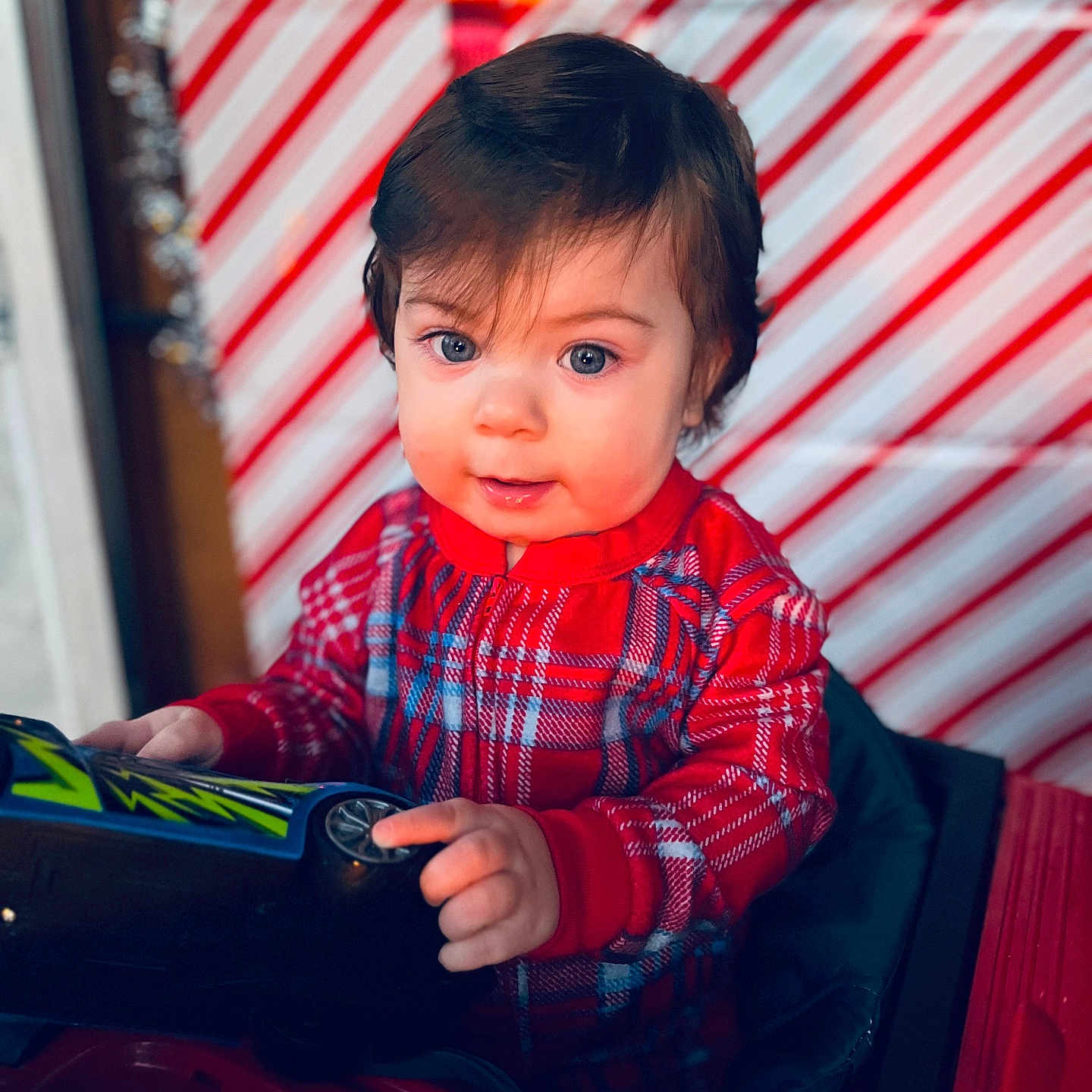 Kaizen is registered to the contest to win money with this photo: baby, bodypart, bottle, clothing, couch, face, finger, furniture, hand, happy, head, pants, person, photography, portrait, shirt, sitting, smile, transportation, vehicle