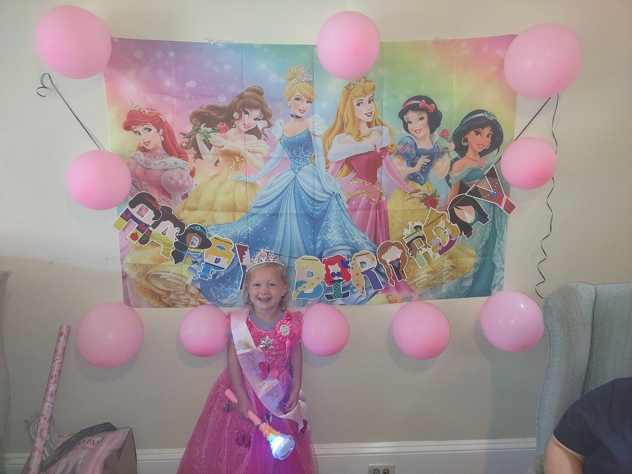 Lillie May is registered to the contest to win money with this photo: art, balloon, beauty, decoration, dress, event, facial_expression, fashion, fun, happy, interior_design, joy, magenta, party_supply, person, pink, smile, snapshot, social_group, style