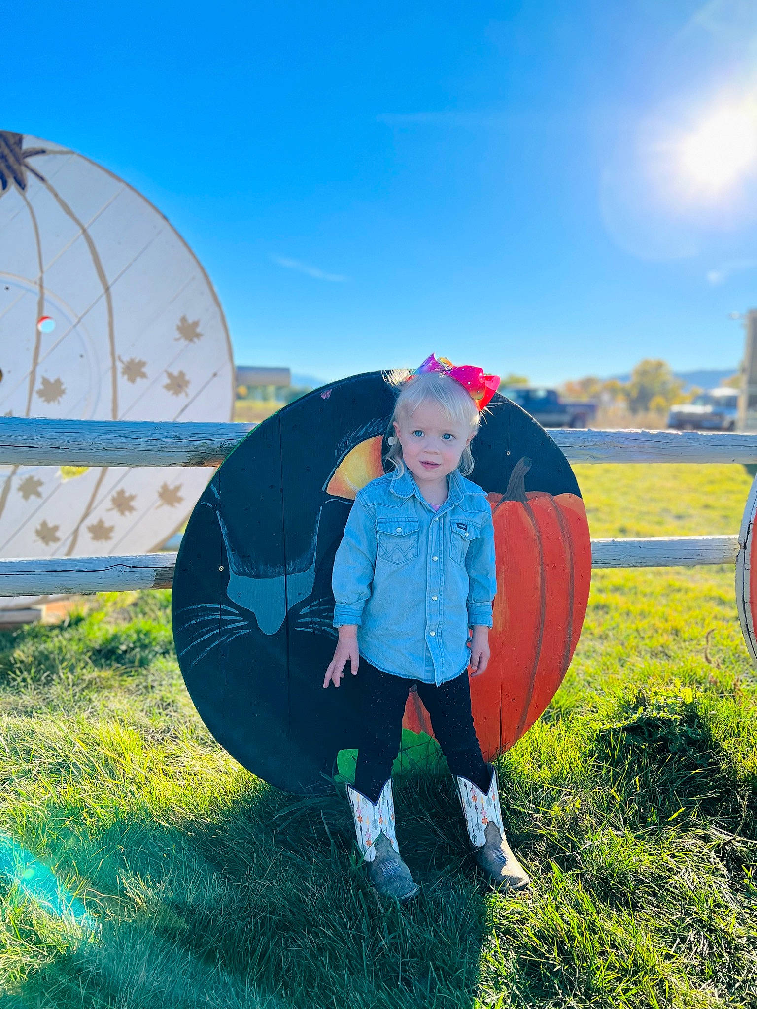 Emma is registered to the contest to win money with this photo: child, circle, electric_blue, fun, games, grass, grassland, happy, landscape, leisure, meadow, people_in_nature, person, plant, play, prairie, recreation, sky, t_shirt, toddler