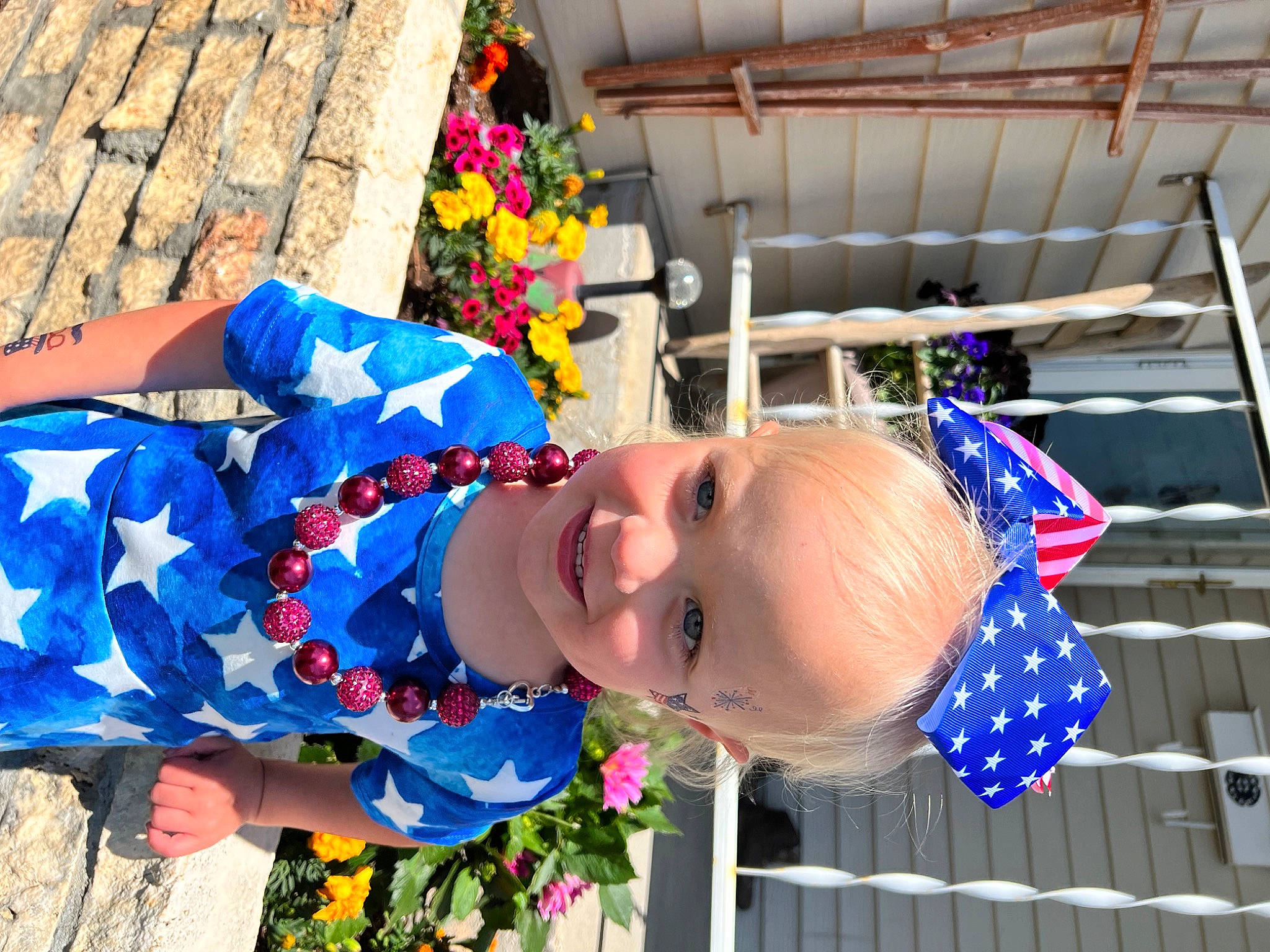 Ava is registered to the contest to win money with this photo: baby, baby_toddler_clothing, blue, child, electric_blue, event, flower, fun, happy, hat, joy, leisure, pattern, people, person, plant, red, smile, toddler, vacation