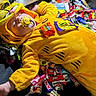 baby, candy, costume, pacifier, sleeping, yellow, tiger, child, cute, sweet, candy_bars, kitkat, twix, kitten_costume, plush, indoors, resting, funny, colorful, soft