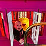 baby, child, playhouse, pink, yellow_chair, window, white_shutters, smiling, holding, cup, indoor, toy, person, happy, face, head, metal_railing, plastic, colorful, young