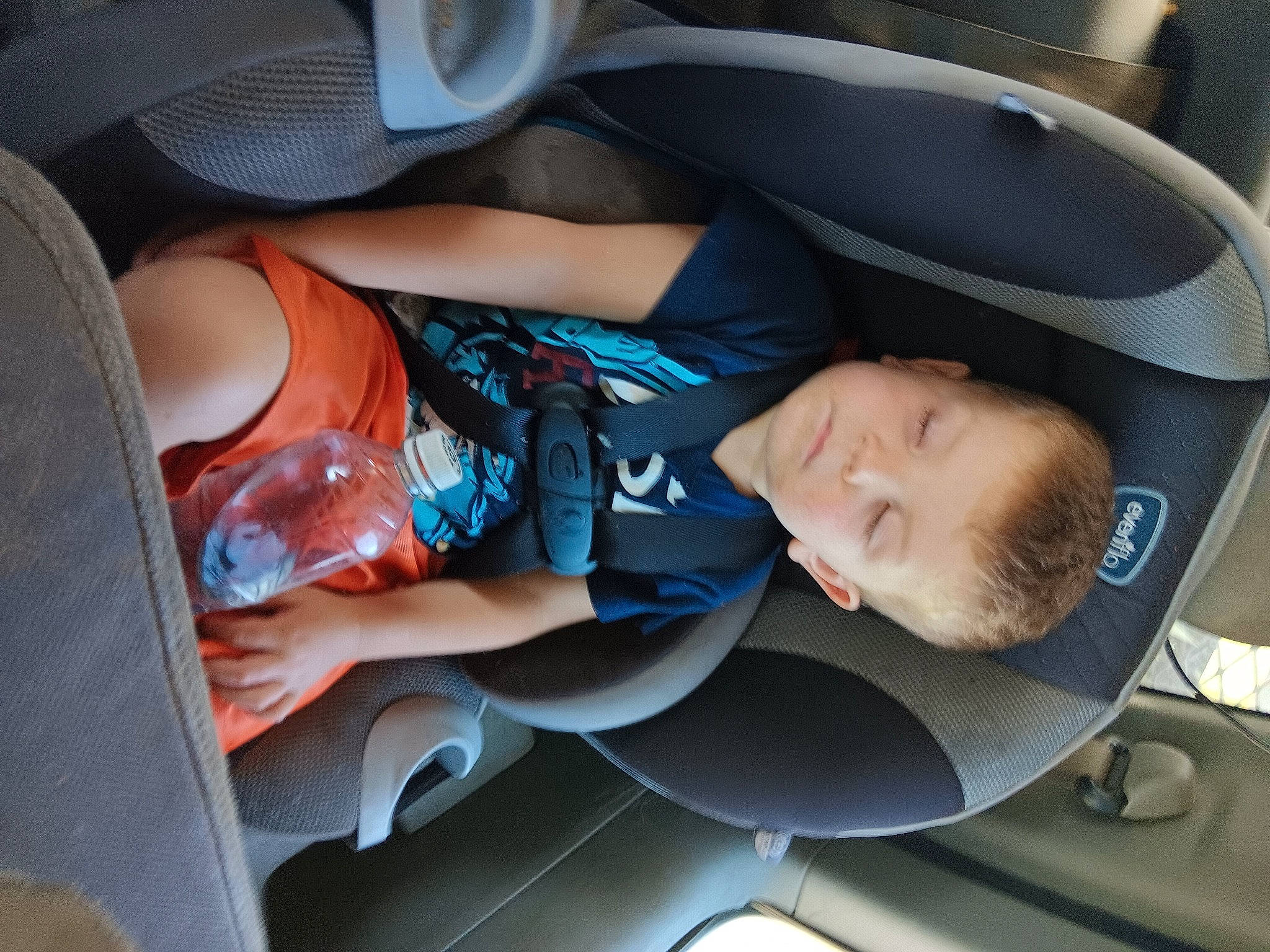 Harvey is registered to the contest to win money with this photo: auto_part, automotive_design, automotive_exterior, automotive_tire, automotive_wheel_system, baby, baby_in_car_seat, baby_products, car_seat, car_seat_cover, child, comfort, electric_blue, fun, luxury_vehicle, motor_vehicle, person, product, toddler, vehicle