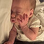 baby, sleeping, infant, hand, face, blanket, bed, peaceful, cute, newborn, soft, rest, cozy, skin, pajamas, child, portrait, closeup, comfort, relaxation