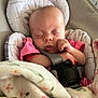 Evelyn Marie joined the competition — help win amazing prizes! baby, sleeping, car_seat, blanket, pink_clothing, infant, face, hands, harness, soft_texture, indoor, cute, peaceful, child, newborn, portrait, cozy, resting, head_support, closeup