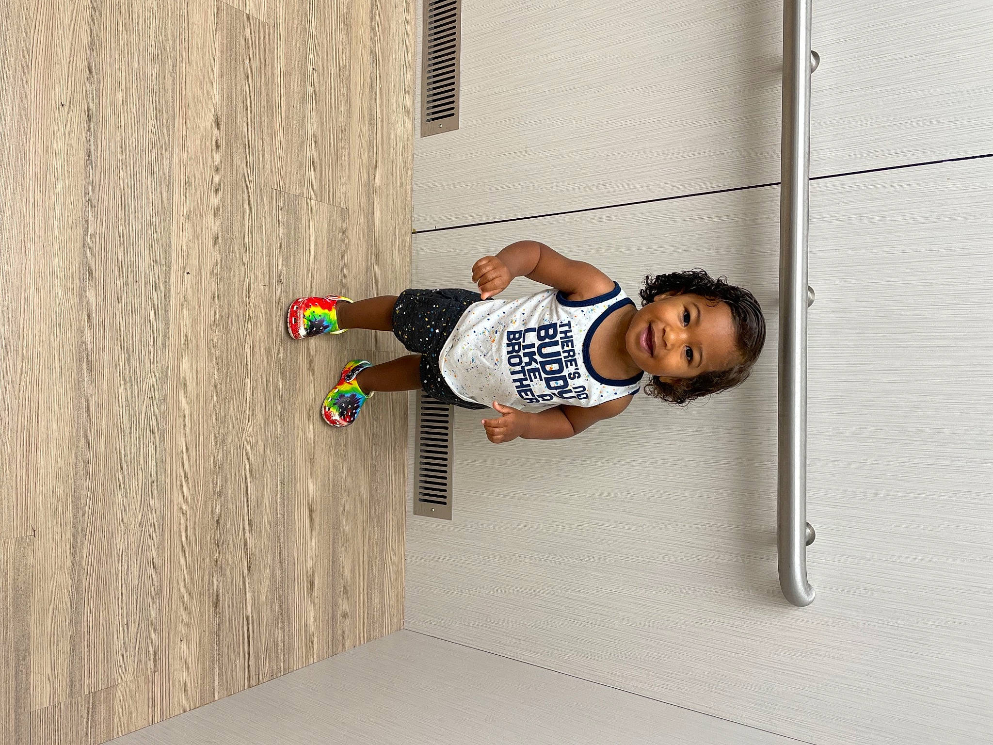 Camryn joined the competition — help win amazing prizes! child, elbow, flooring, fun, hardwood, human_leg, joy, knee, leg, pattern, person, recreation, room, shoe, shorts, sitting, sportswear, t_shirt, thigh, toddler