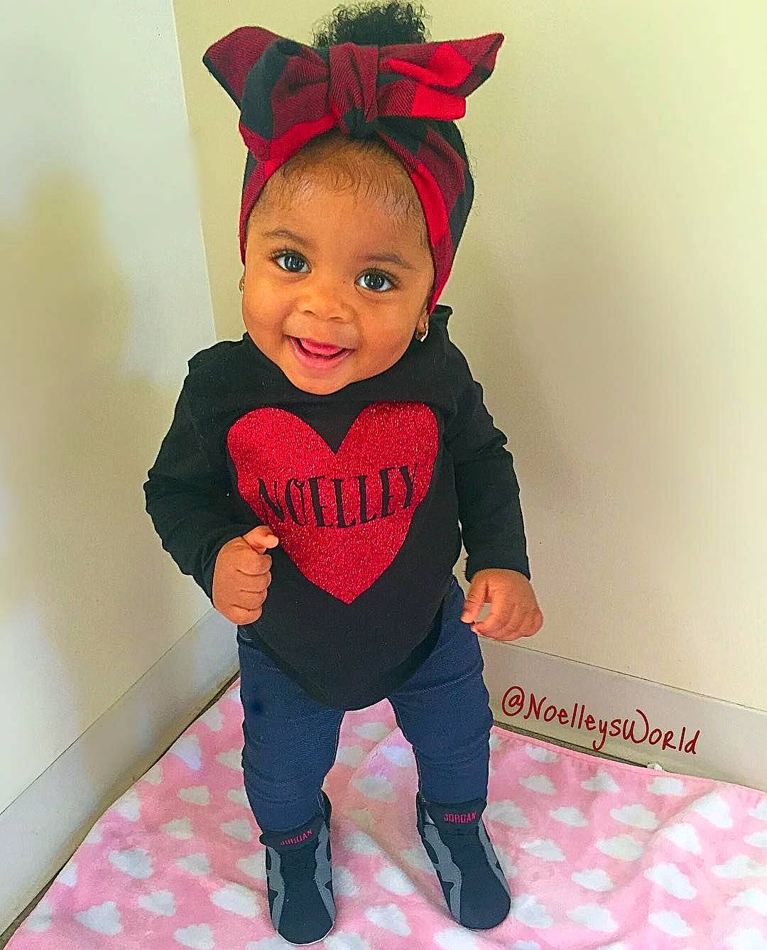 Madi is registered to the contest to win money with this photo: baby, baby_products, baby_toddler_clothing, child, clothing, costume, ear, happy, head, joy, lip, organ, person, pink, product, red, skin, sleeve, smile, t_shirt