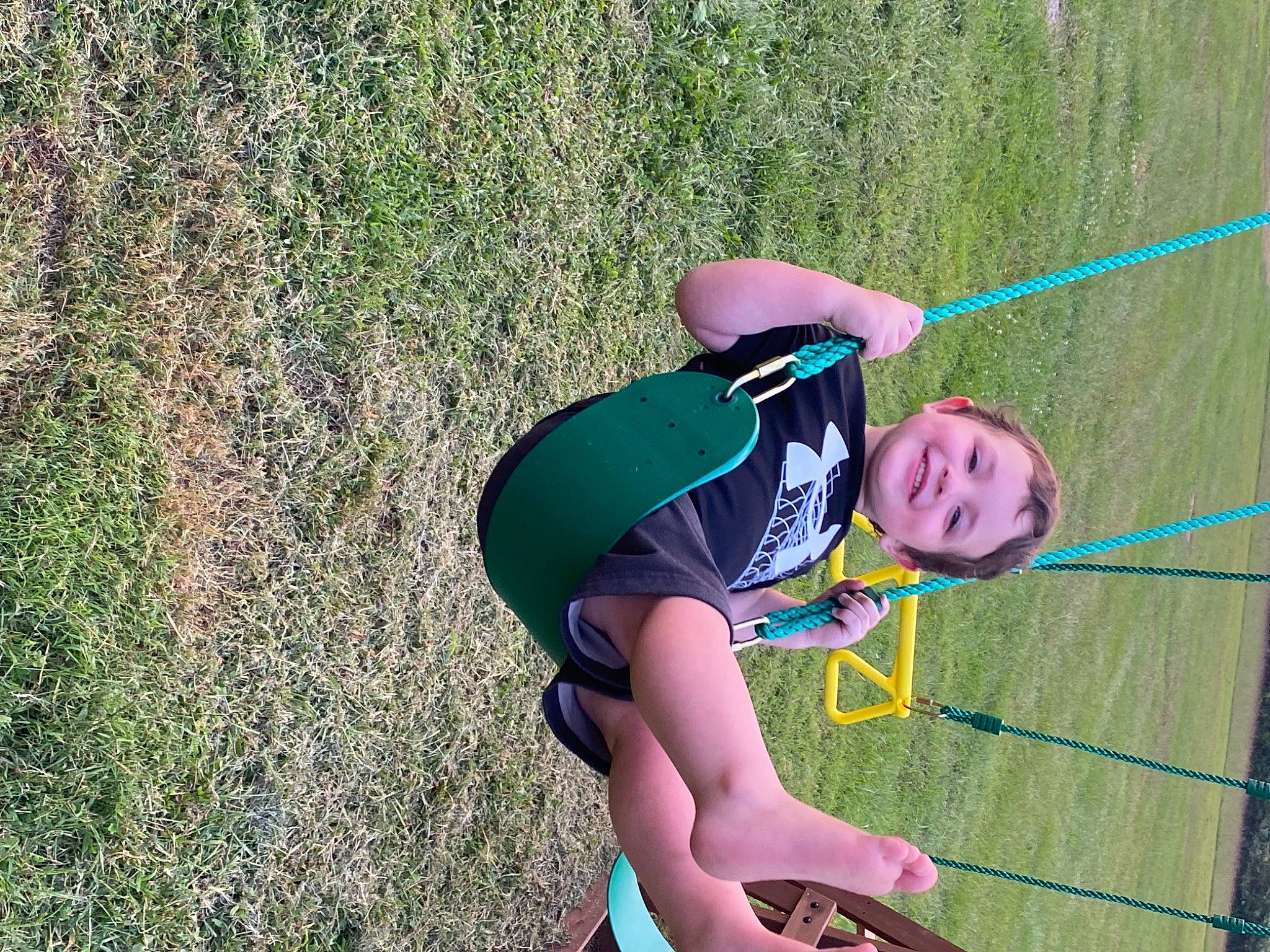 Kace is registered to the contest to win money with this photo: balance, competition_event, electric_blue, exercise, fun, grass, grass_family, human_leg, joy, knee, leisure, net, people_in_nature, person, physical_fitness, player, recreation, rope, shorts, sports