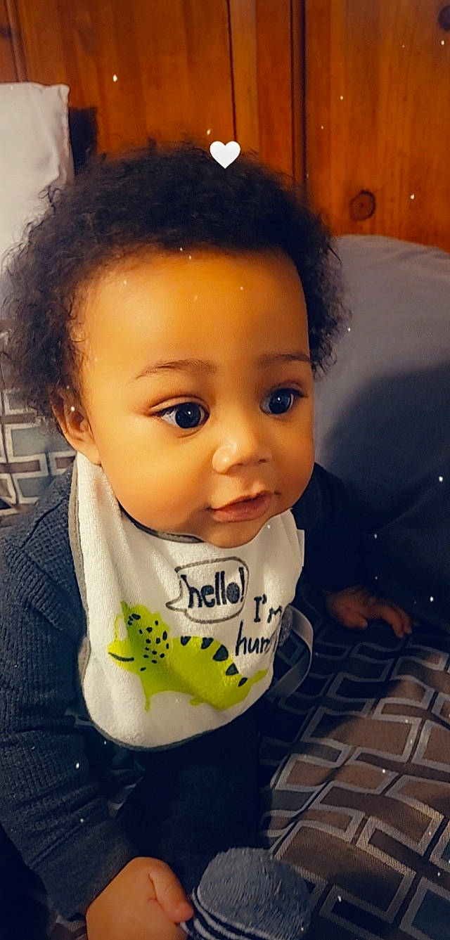 Kashton joined the competition — help win amazing prizes! baby, baby_toddler_clothing, bib, black_hair, cheek, chin, cool, ear, eyebrow, eyelash, facial_expression, forehead, fun, happy, iris, lip, nose, person, skin, sleeve