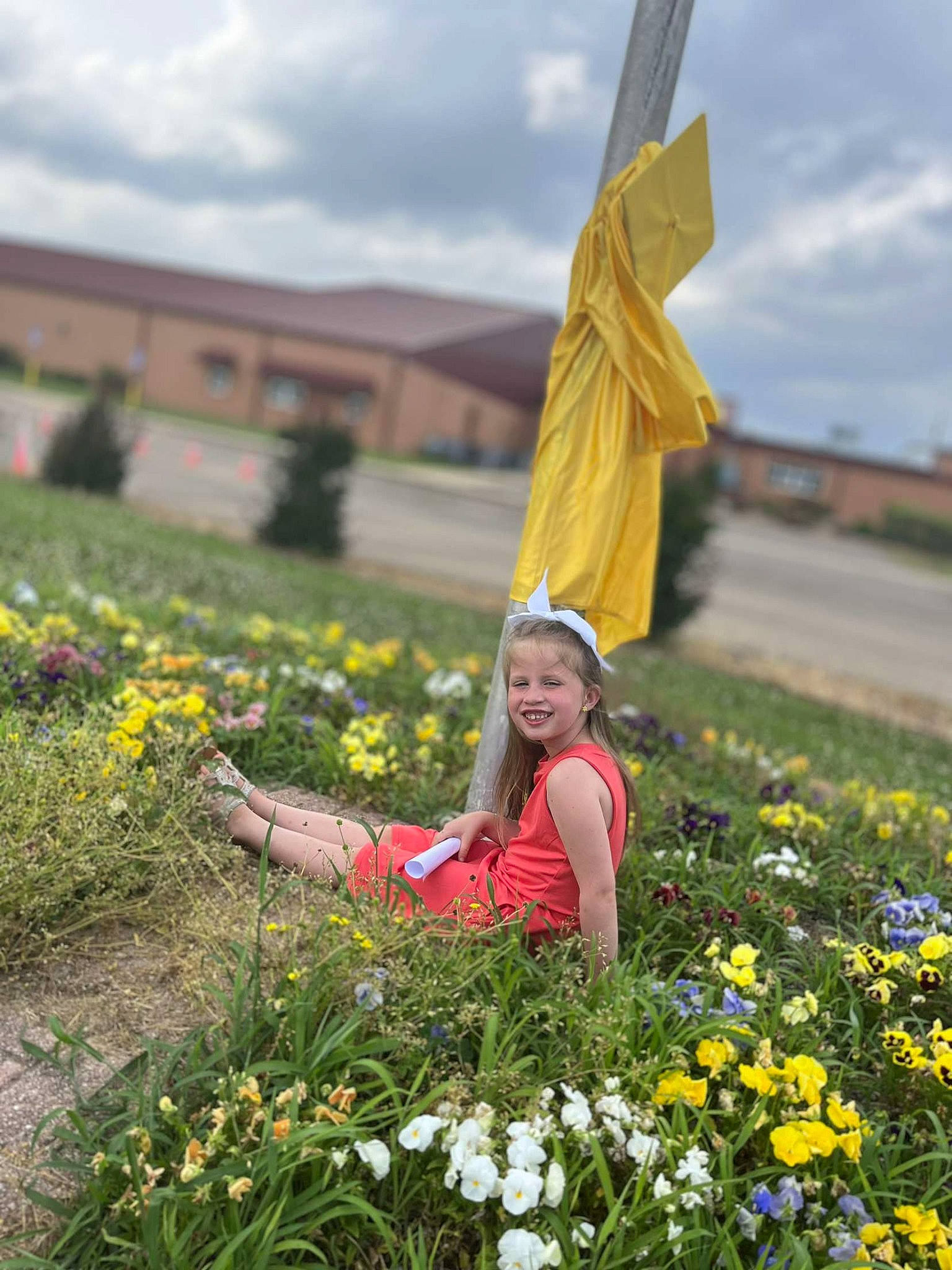 Nevaeh joined the competition — help win amazing prizes! agriculture, botany, cloud, flag, flower, grass, grass_family, grassland, happy, joy, landscape, leaf, meadow, natural_environment, people_in_nature, person, petal, plant, sky, smile