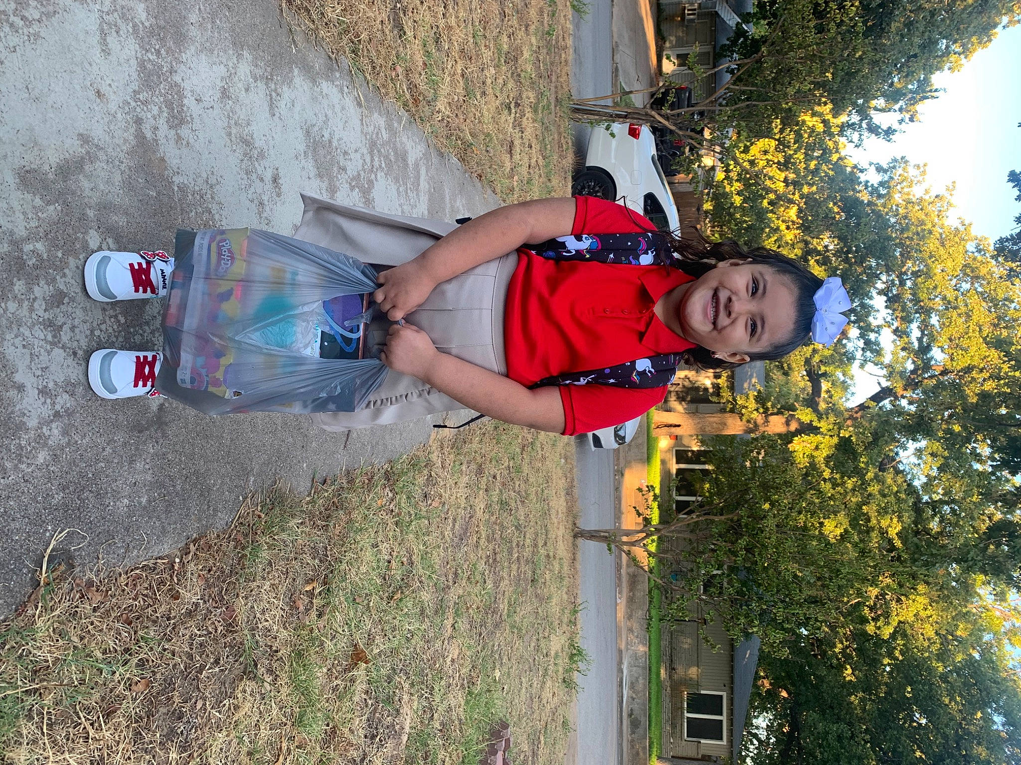 Lilliana is registered to the contest to win money with this photo: adventure, fun, happy, hat, human_leg, joy, leisure, outdoor_shoe, person, plant, recreation, shoe, shorts, smile, sneakers, soil, t_shirt, thigh, tree, walking_shoe