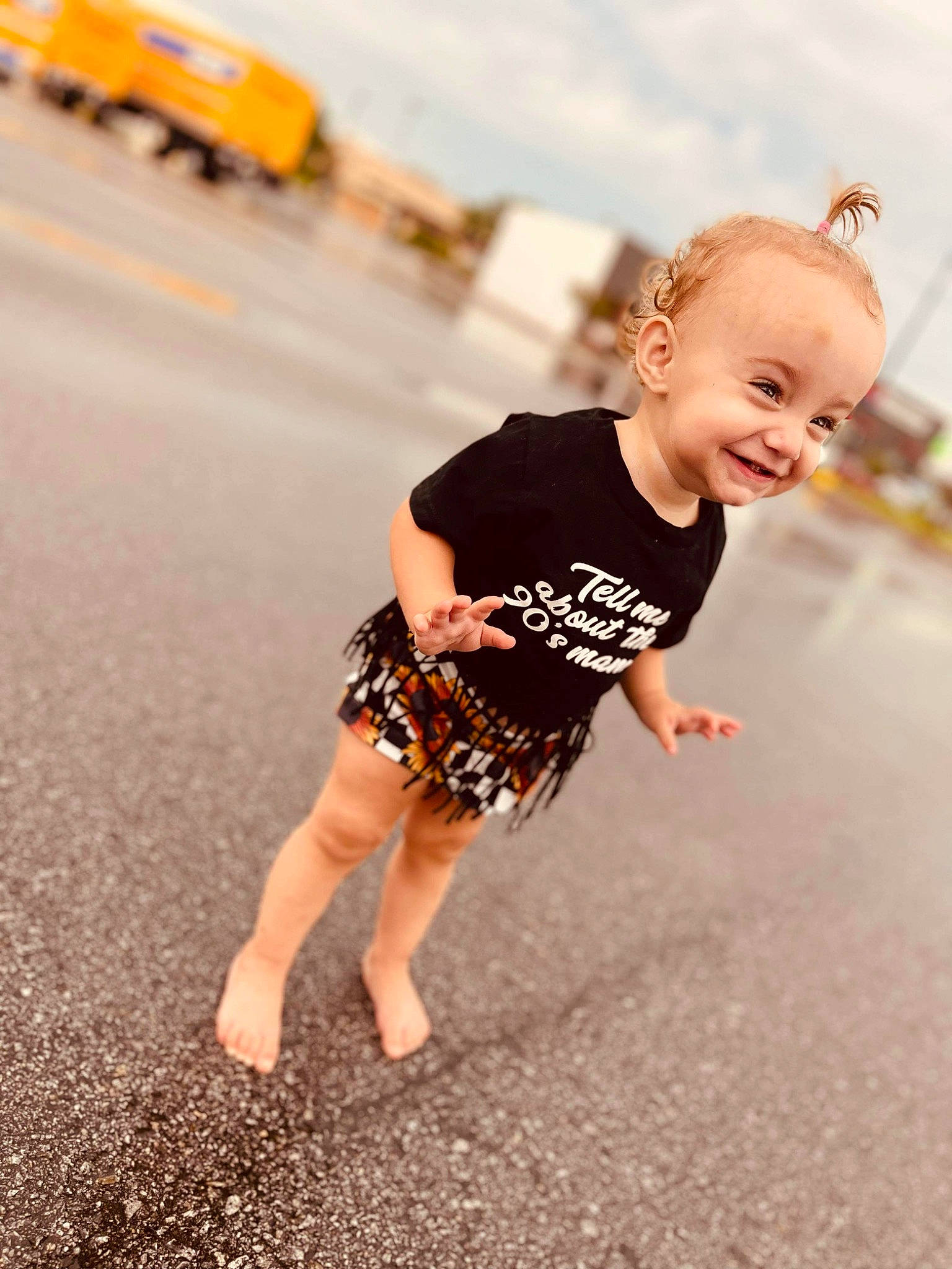 Oaklynn is registered to the contest to win money with this photo: aircraft, asphalt, baby_toddler_clothing, barefoot, child, cloud, eye, flash_photography, flooring, fun, happy, joy, person, sky, sleeve, smile, t_shirt, tire, toddler, truck