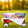 Rayan joined the competition — help win amazing prizes! baby, wagon, red_wagon, pillows, striped_pillows, blanket, glass_bottles, coca_cola, bottle, grass, outdoor, sunset, golden_hour, smiling, child, cute, happy, toy, nature, portrait