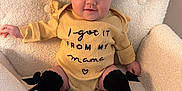Arizona joined the competition — help win amazing prizes! baby, infant, bow_headband, black_bow, onesie, text_on_clothing, smiling, cozy_chair, plush_chair, knee_high_socks, black_socks, yellow_outfit, knit_blanket, embroidered_text, portrait, indoor, chubby_cheeks, hands, legs, cute