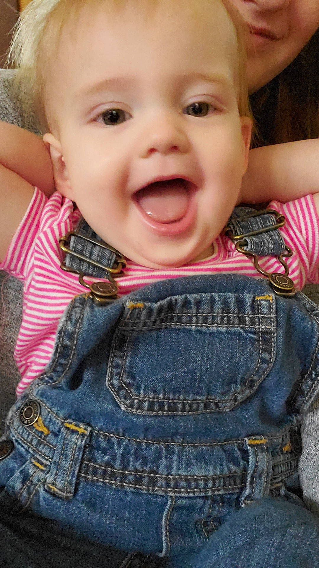 Kira is registered to the contest to win money with this photo: baby, cheek, child, chin, cool, denim, eye, face, facial_expression, head, jeans, lip, mouth, nose, organ, person, skin, smile, textile, toddler