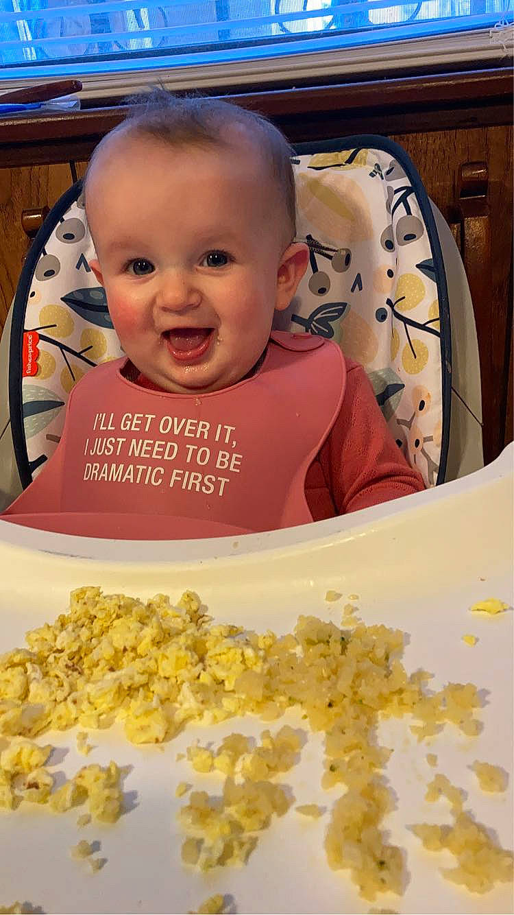 Aubrie is registered to the contest to win money with this photo: baby, baby_toddler_clothing, cheek, child, comfort_food, cuisine, dish, font, food, fun, happy, head, ingredient, junk_food, person, photo_caption, product, recipe, smile, sweetness
