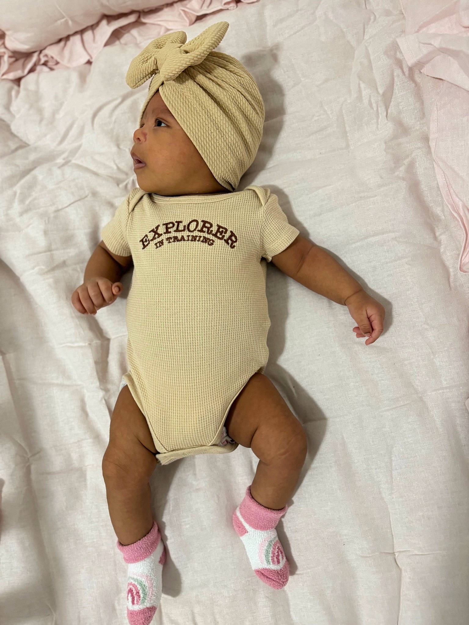 Anya joined the competition — help win amazing prizes! baby, baby_products, baby_safety, baby_sleeping, baby_toddler_clothing, cap, child, comfort, fashion_accessory, hat, headgear, headwear, human_leg, linens, pattern, person, pink, sleeve, sock, thigh
