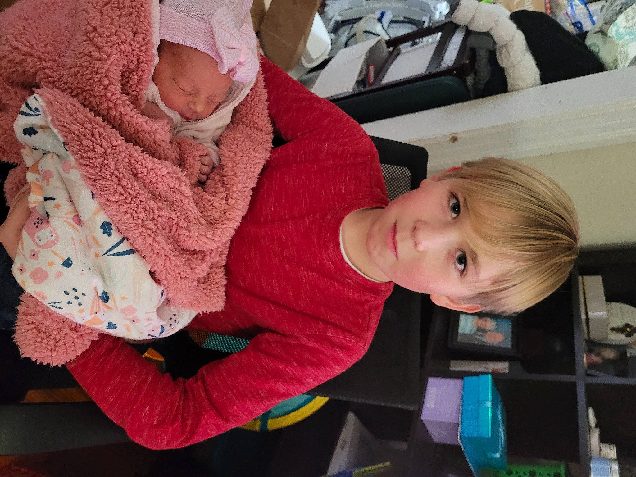 Tristan joined the competition — help win amazing prizes! baby, baby_products, baby_toddler_clothing, child, comfort, facial_expression, fun, joint, knit_cap, lap, magenta, pattern, person, play, room, sitting, sleeve, smile, toddler, wool