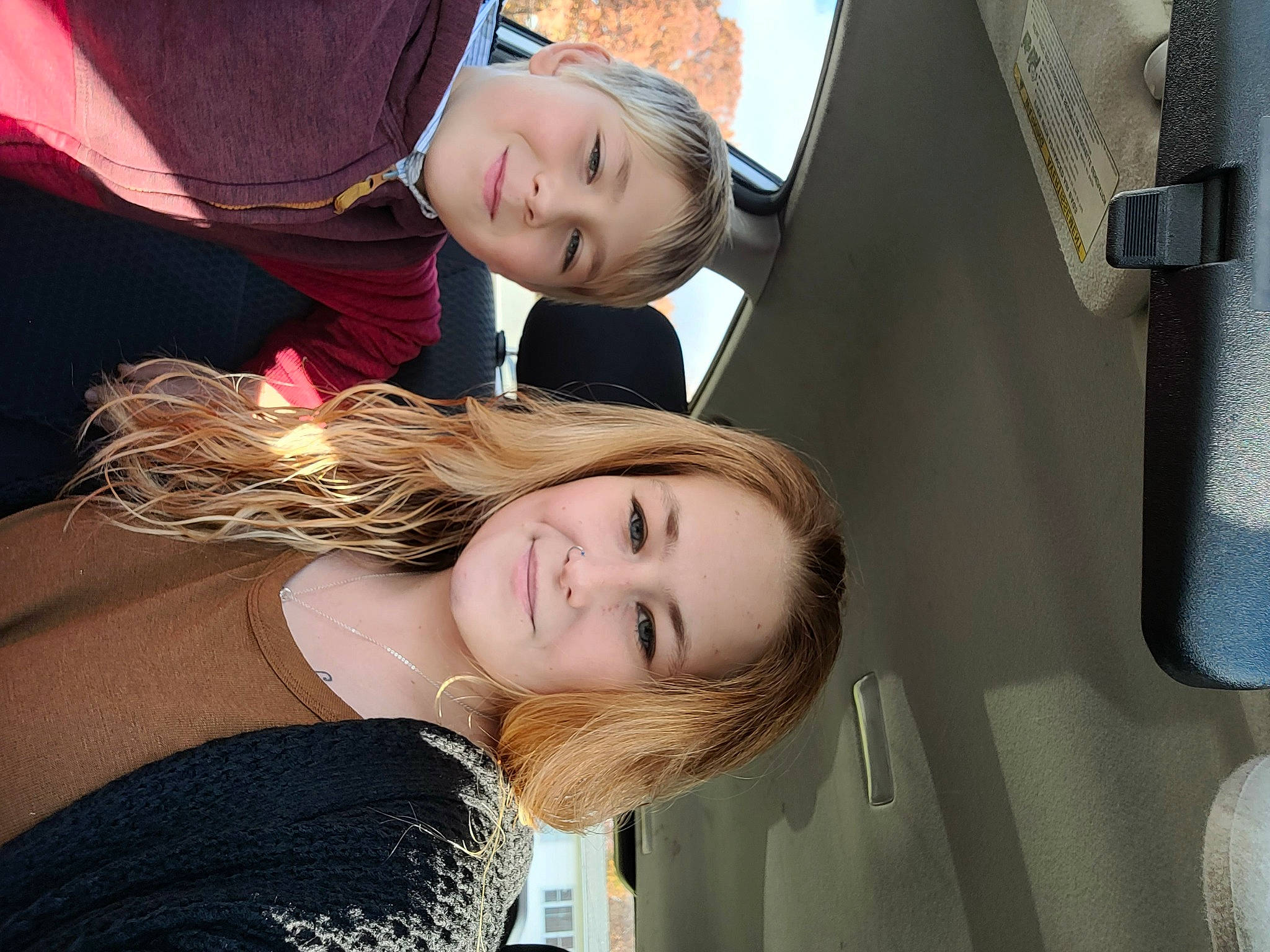 Tristan is registered to the contest to win money with this photo: automotive_exterior, beauty, blond, child, event, eye, face, flash_photography, fun, happy, head, joy, leisure, lip, motor_vehicle, person, sitting, skin, smile, toddler