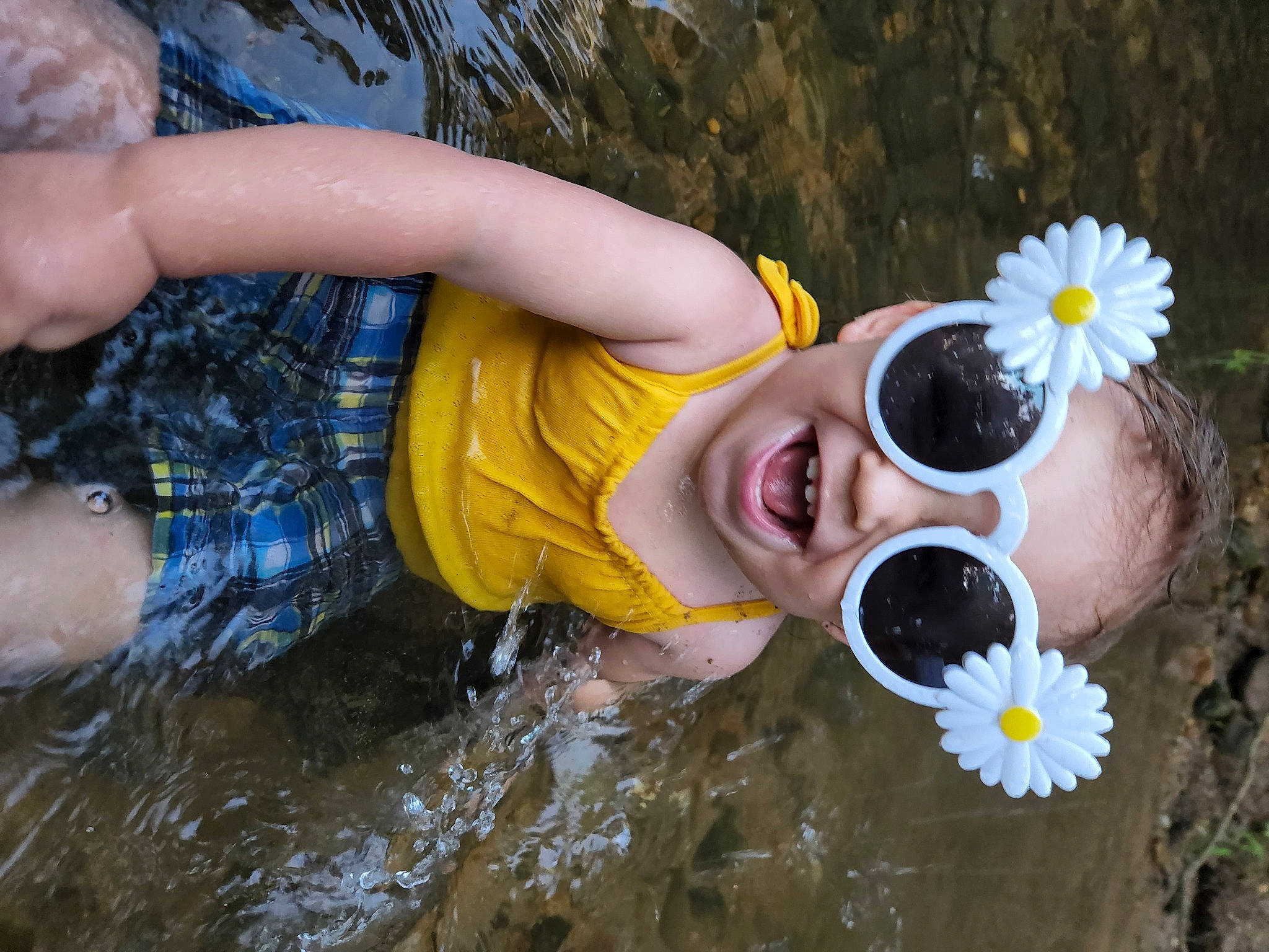Rowan joined the competition — help win amazing prizes! eye, eyewear, facial_expression, flower, goggles, grass, happy, head, headgear, human_body, mammal, nature, nose, people_in_nature, person, petal, smile, sunglasses, vertebrate, vision_care